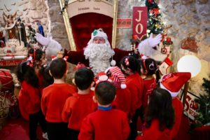 Santa Claus with kids from Jerusalem